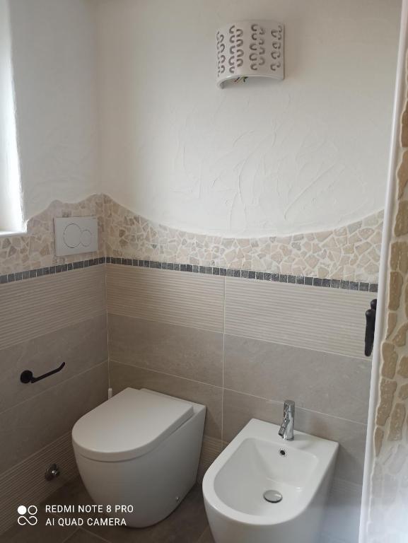 A bathroom at Bello Bello Rooms