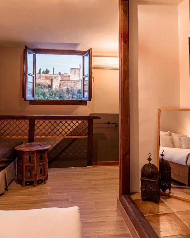 Postel nebo postele na pokoji v ubytování Casa Bombo