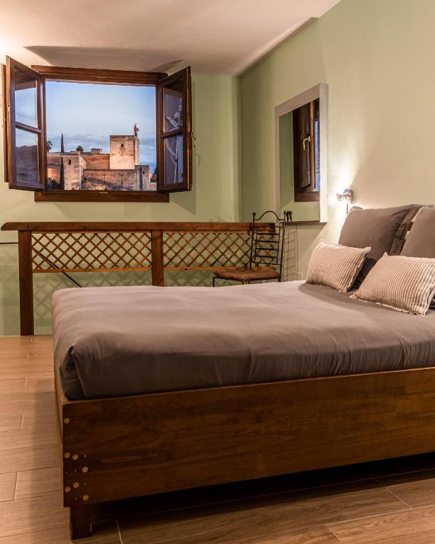 Postel nebo postele na pokoji v ubytování Casa Bombo