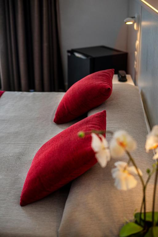 Een bed of bedden in een kamer bij Hotel Tarba