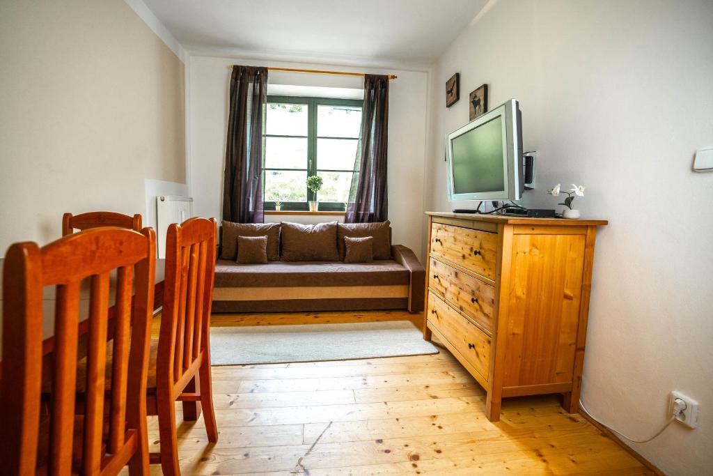 Telewizja i/lub zestaw kina domowego w obiekcie Apartmán Svatý Petr