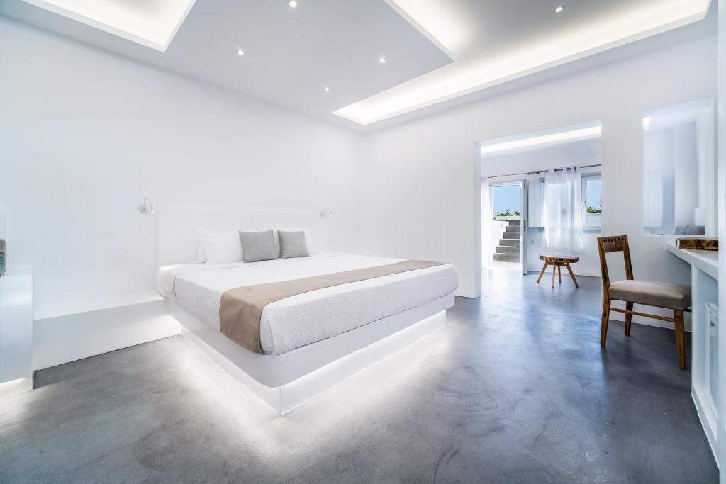 Postel nebo postele na pokoji v ubytování Serenità Luxury Suites