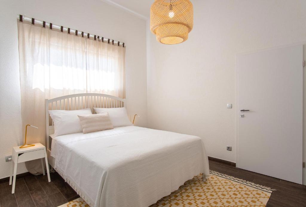 Postel nebo postele na pokoji v ubytování Beachfront Paladina holiday home