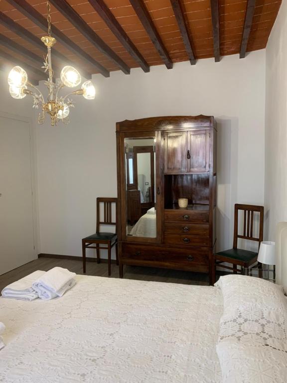 Postel nebo postele na pokoji v ubytování Fonte alle Ninfe B&B