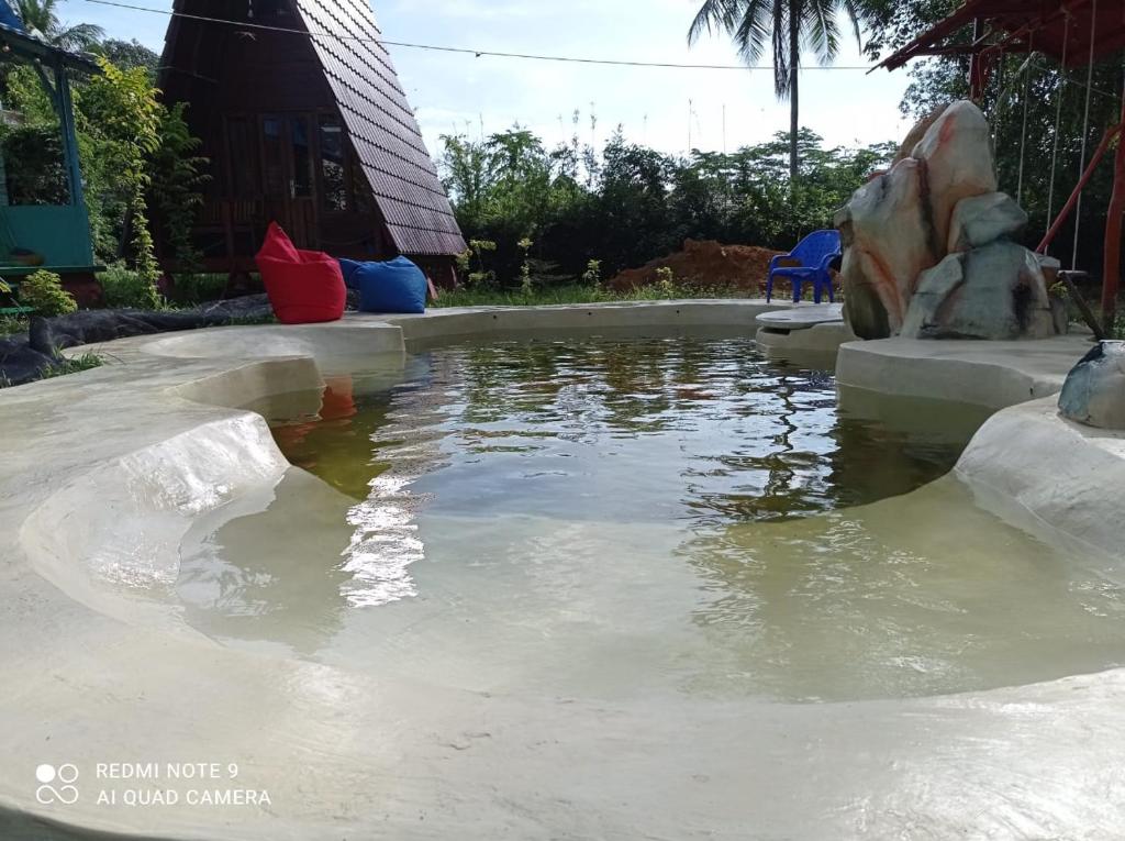 Bazén v ubytování Tanjong Tinggi Cottage nebo v jeho okolí