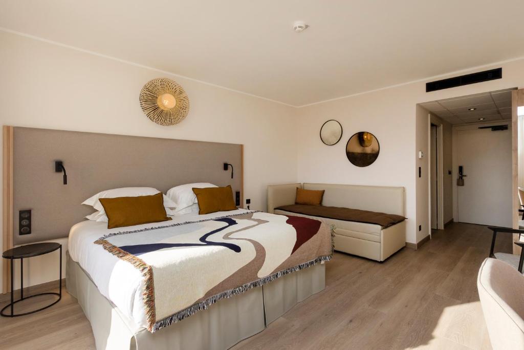 Postel nebo postele na pokoji v ubytování Hotel L'Acquale