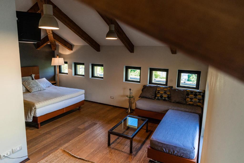 Postel nebo postele na pokoji v ubytování Hotel Langhe