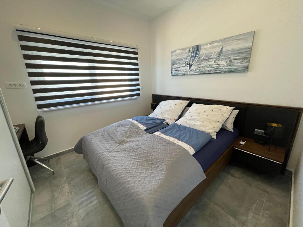 Posteľ alebo postele v izbe v ubytovaní Palms & Beach Maslenica