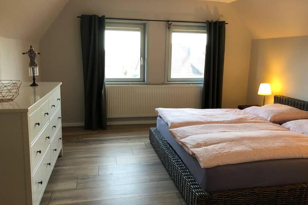 Кровать или кровати в номере Harzhaus Ida