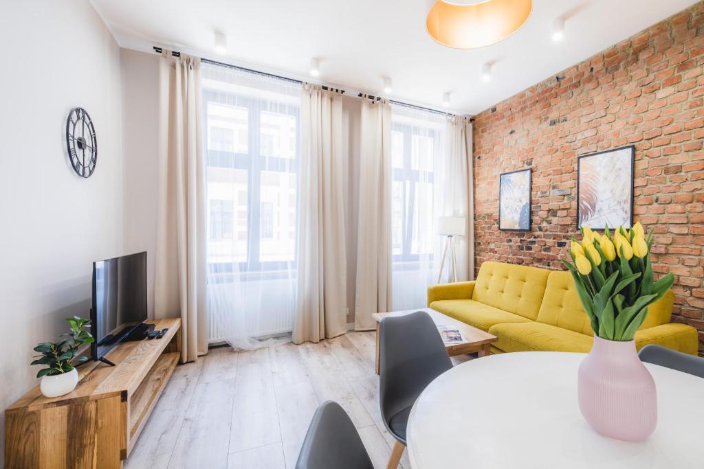 Televízia a/alebo spoločenská miestnosť v ubytovaní Modern Apartments Toruń 1 Stare Miasto-Centrum