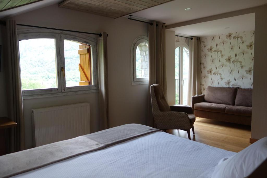 Postel nebo postele na pokoji v ubytování Hotel Abetos