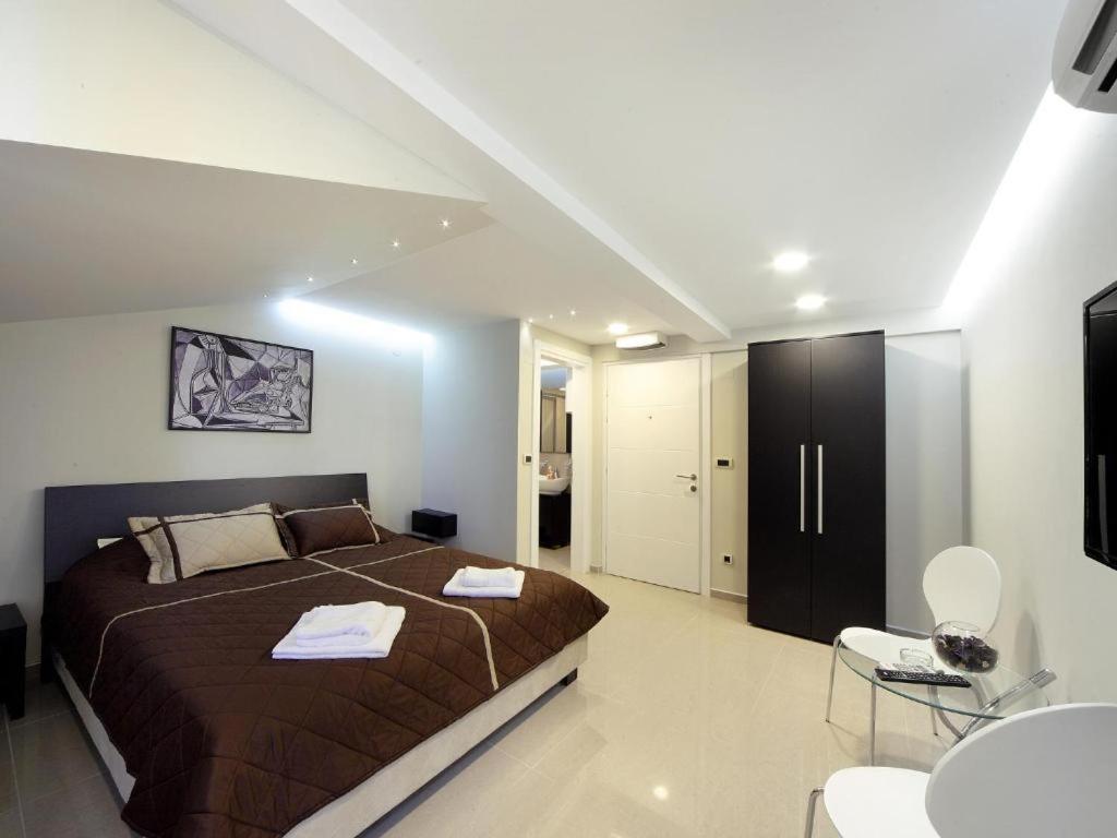 Postel nebo postele na pokoji v ubytování Agent Lux Apartments