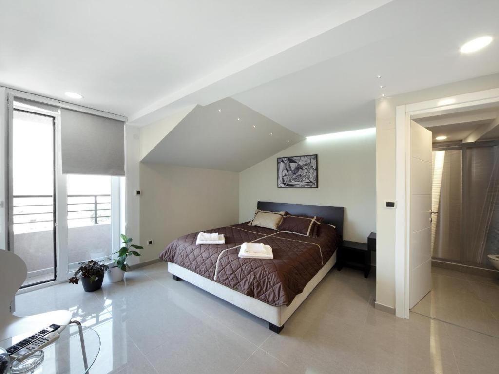 Postel nebo postele na pokoji v ubytování Agent Lux Apartments
