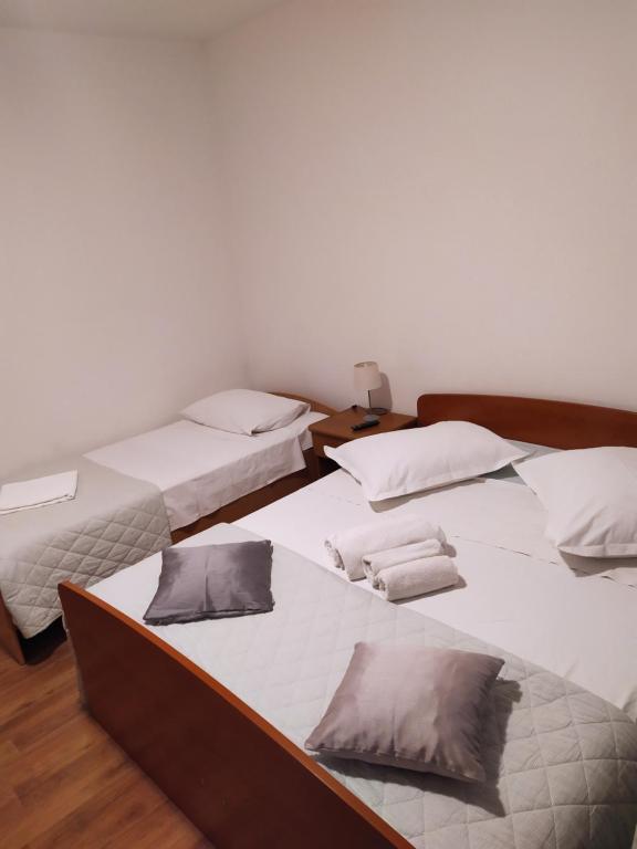 Postel nebo postele na pokoji v ubytování Krka Ivan