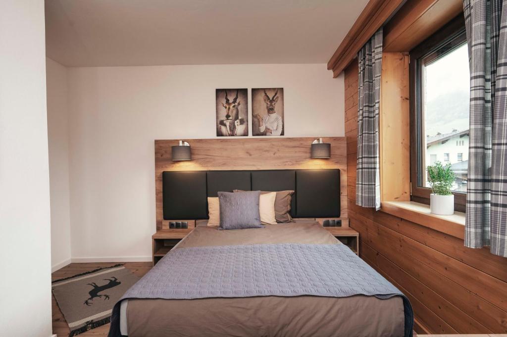 Postel nebo postele na pokoji v ubytování Golf & Ski Chalet