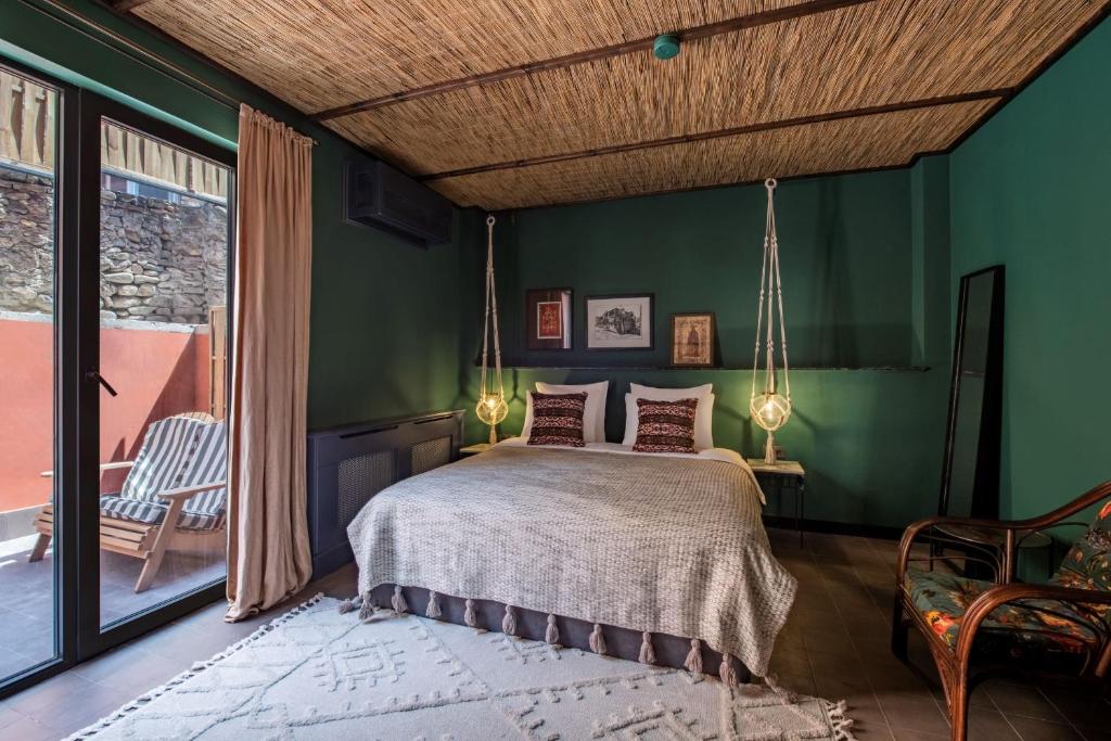 Postel nebo postele na pokoji v ubytování Communal Hotel Telavi