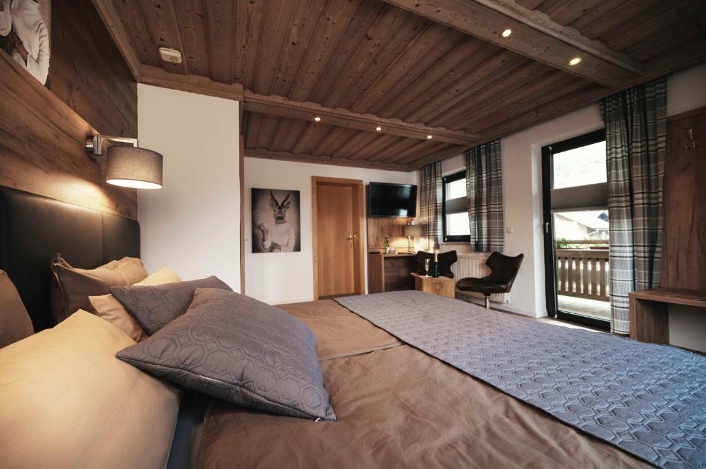 Postel nebo postele na pokoji v ubytování Golf & Ski Chalet