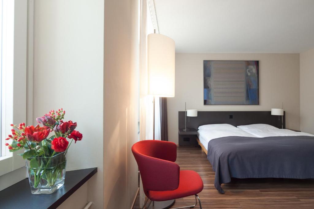 Llit o llits en una habitació de Altstadt Hotel