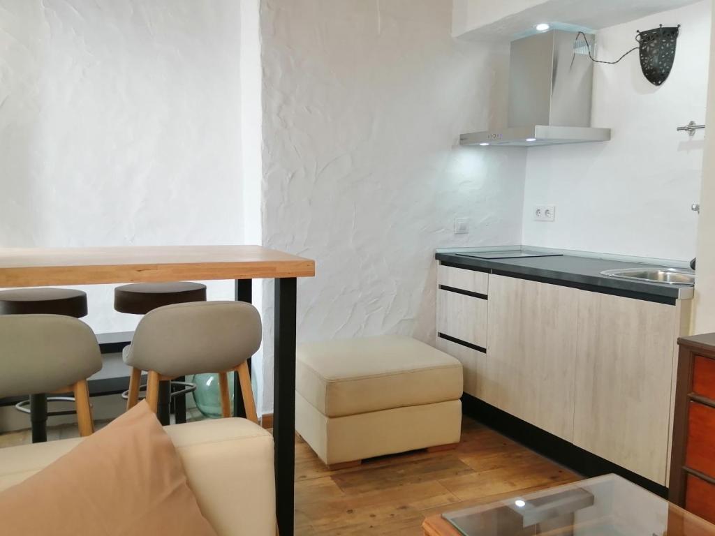 Kuchyň nebo kuchyňský kout v ubytování La Guarida de Vejer Casa Rural