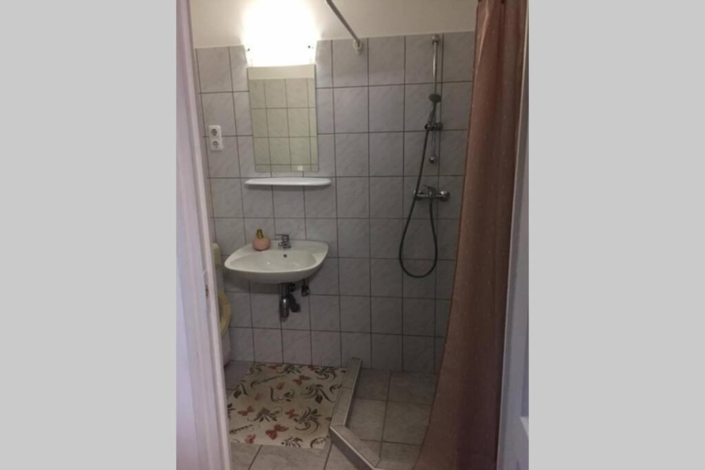 Kúpeľňa v ubytovaní JAndi apartman