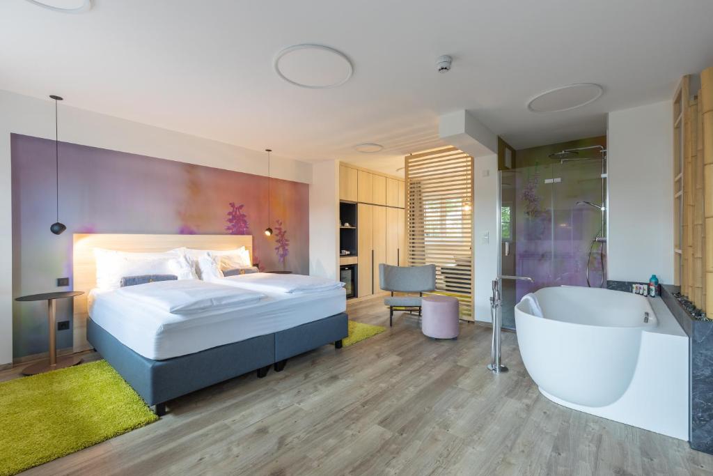 Postel nebo postele na pokoji v ubytování Hotel Bei Gretel, Wellness & Ayurveda