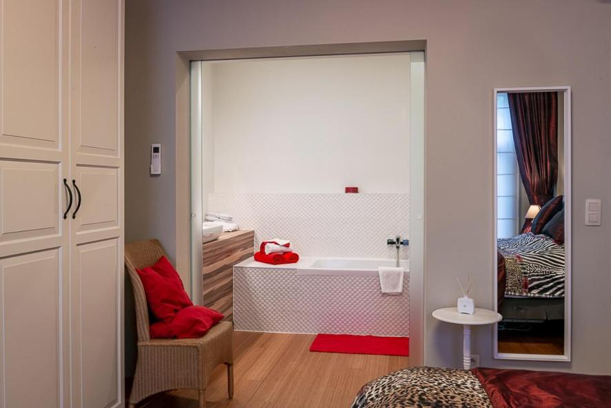 Postel nebo postele na pokoji v ubytování Adamas B&B