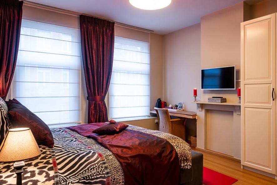 Postel nebo postele na pokoji v ubytování Adamas B&B