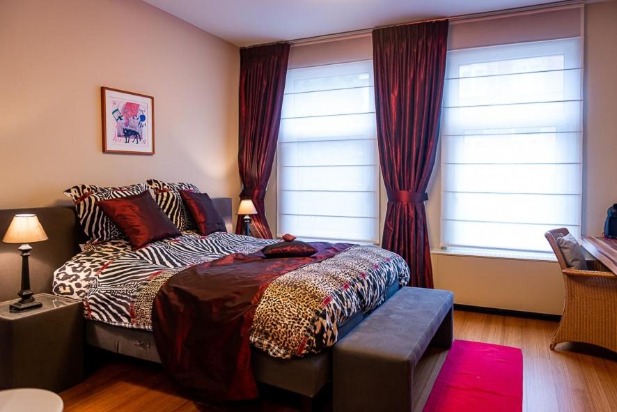 Postel nebo postele na pokoji v ubytování Adamas B&B