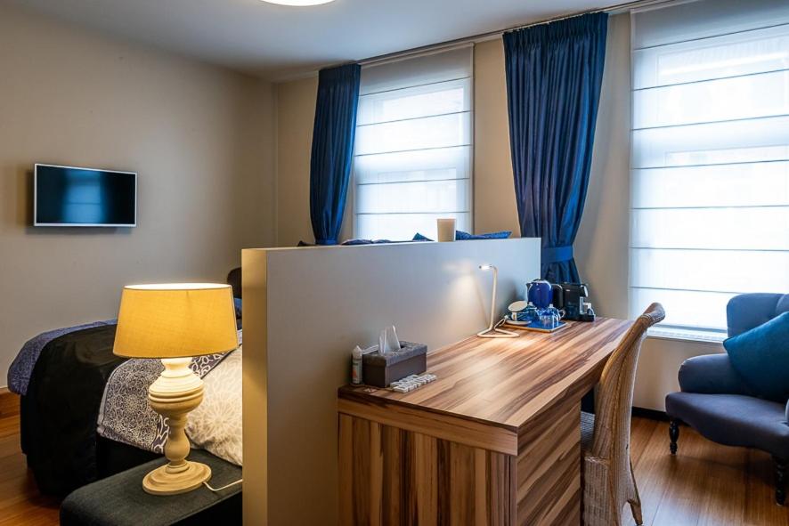 TV a/nebo společenská místnost v ubytování Adamas B&B