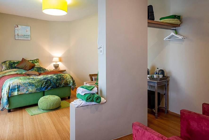 Postel nebo postele na pokoji v ubytování Adamas B&B