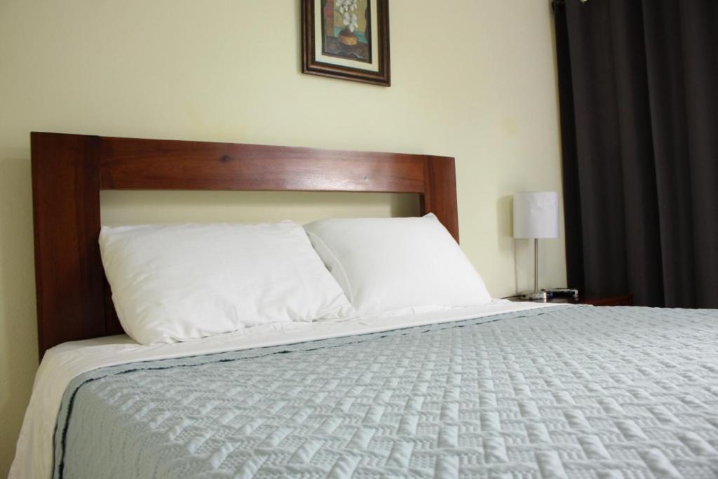 Postel nebo postele na pokoji v ubytování Hotel Anedi