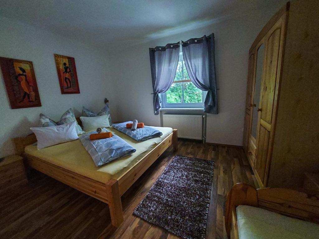 Postel nebo postele na pokoji v ubytování Haus Emily