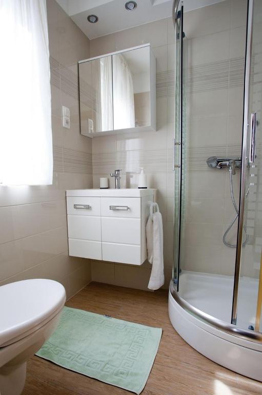 Kúpeľňa v ubytovaní Apartments Vrbnik (879)