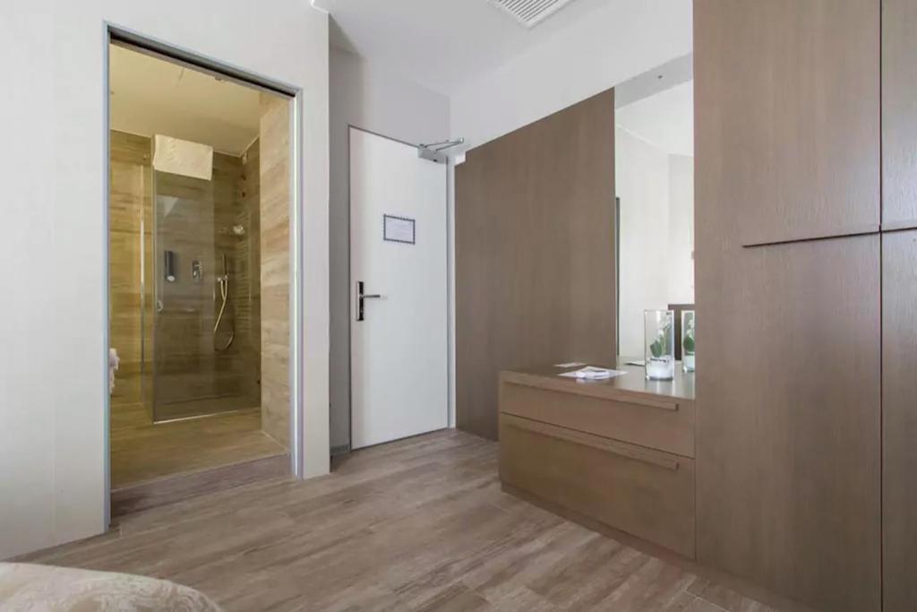 Koupelna v ubytování Ginevra Rooms