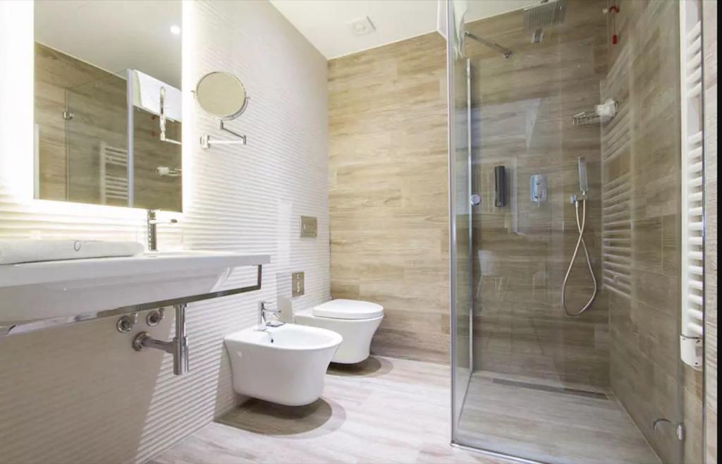 Koupelna v ubytování Ginevra Rooms