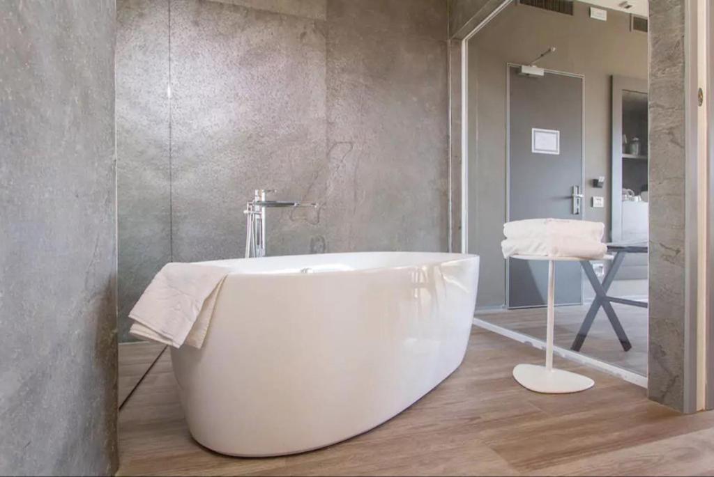 Koupelna v ubytování Ginevra Rooms