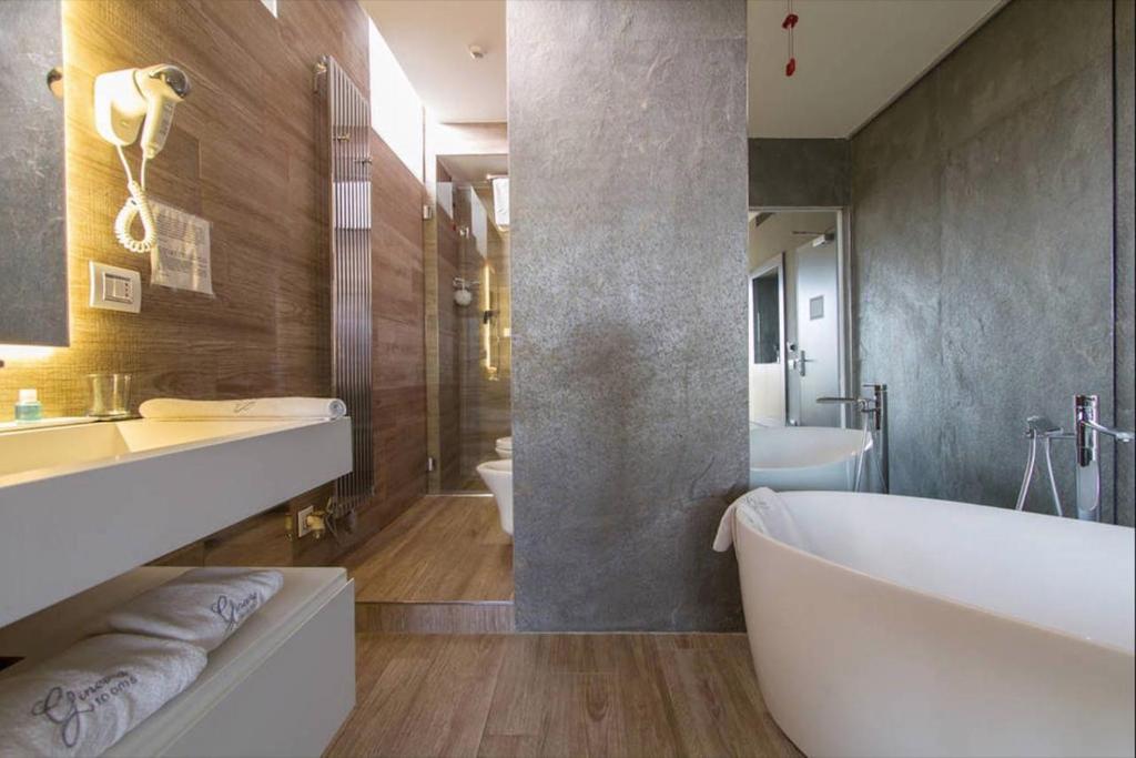 Koupelna v ubytování Ginevra Rooms