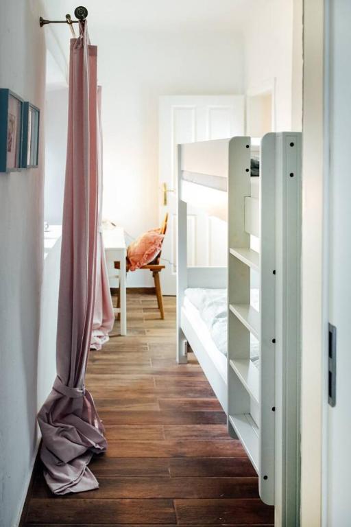 Posteľ alebo postele v izbe v ubytovaní Apartment Aussee- Beletage Salzherrenhof- Küche, WLAN, Netflix