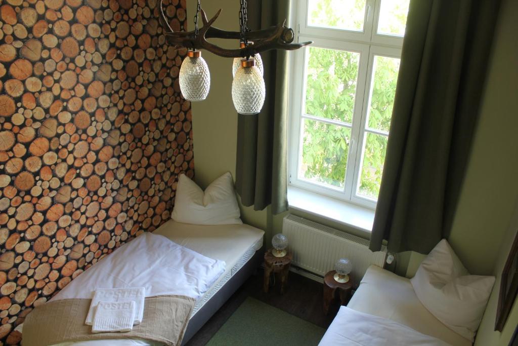 Postel nebo postele na pokoji v ubytování Postel Wolgast