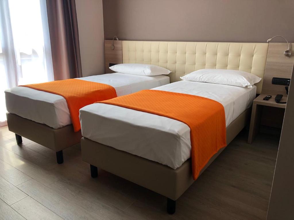 Postel nebo postele na pokoji v ubytování Hotel Folen