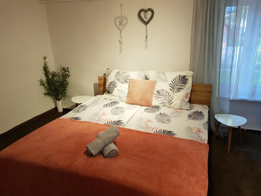 Posteľ alebo postele v izbe v ubytovaní Apartament Wiejska Sielanka