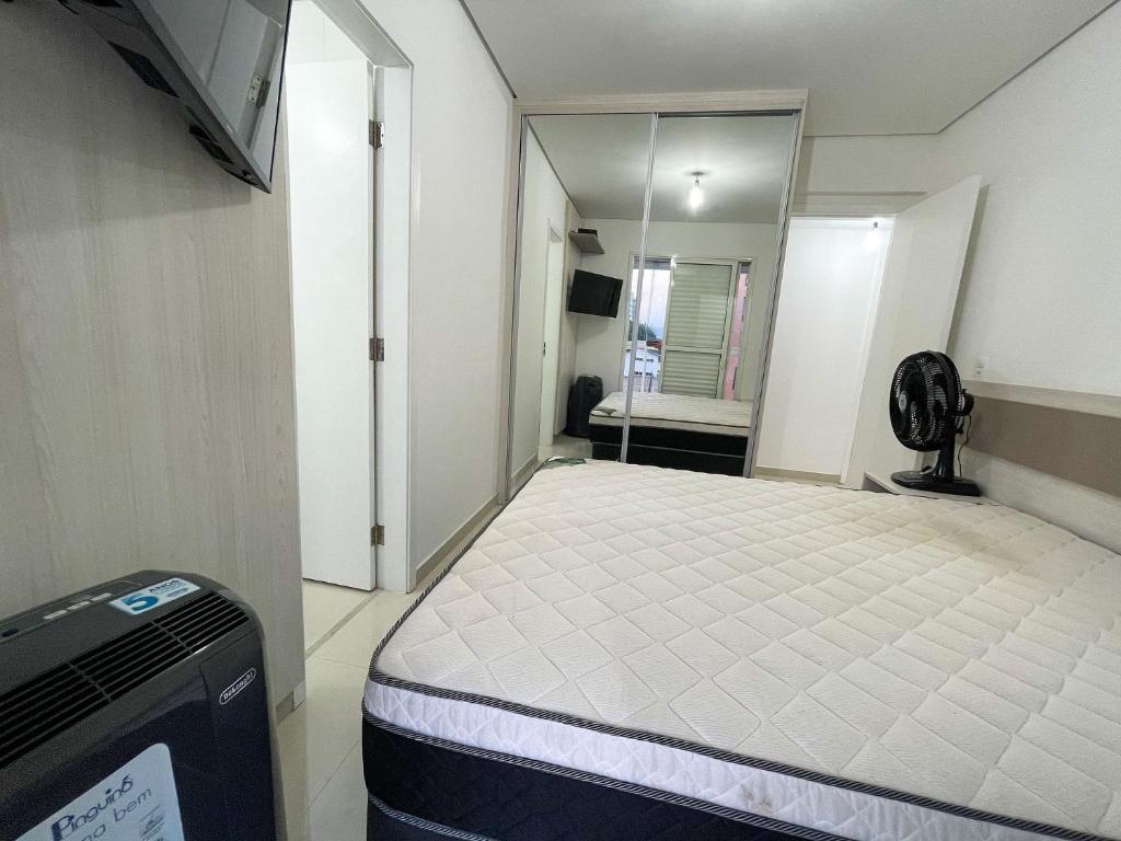  Apartamento de Frente ao Mar em Bertioga - Comodidade e Lazer