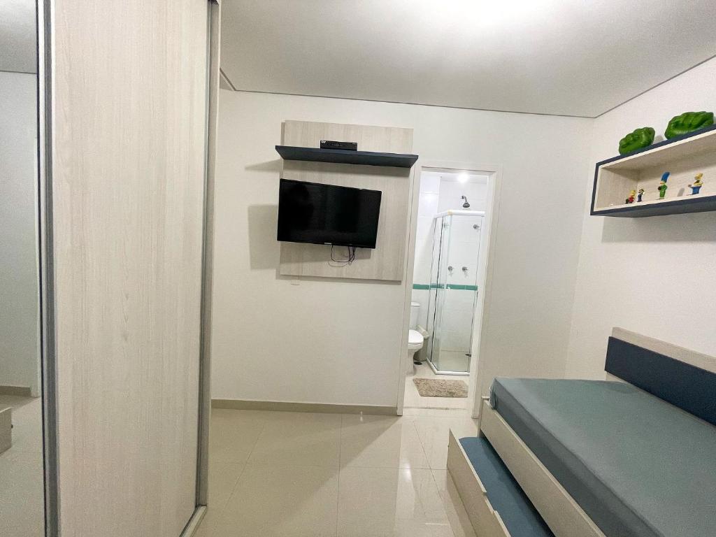  Apartamento de Frente ao Mar em Bertioga - Comodidade e Lazer