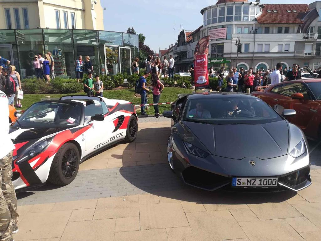 a couple of cars parked next to each other at Apartment Siofok, Lake Balaton 16 in Somogyfok