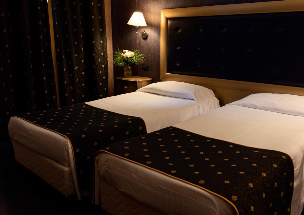 Postel nebo postele na pokoji v ubytování Hotel - Motel Flower
