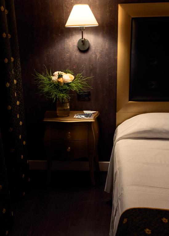 Postel nebo postele na pokoji v ubytování Hotel - Motel Flower