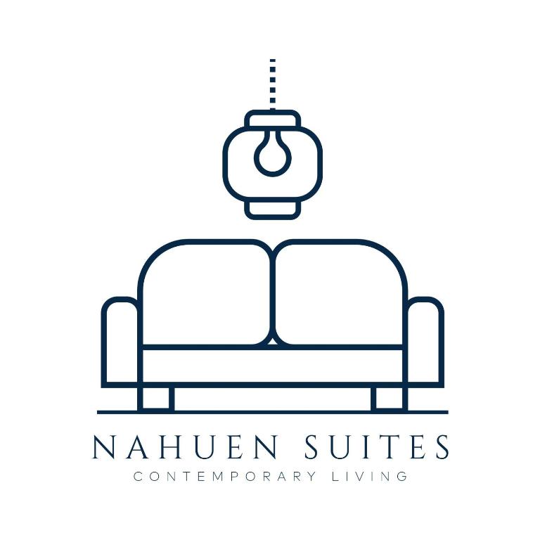 A seating area at Charming City Apartment - by Nahuen Suites