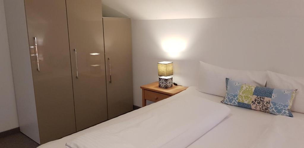Postel nebo postele na pokoji v ubytování Ferienwohnung Wüstner