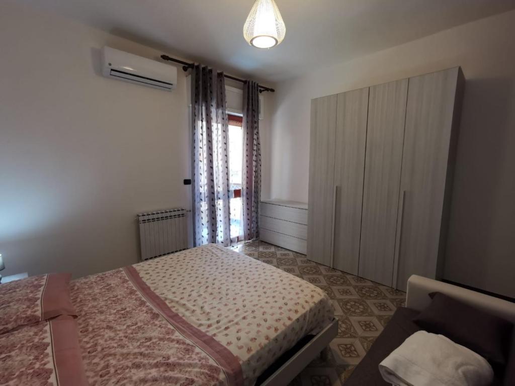 A bed or beds in a room at Casa Smeraldo