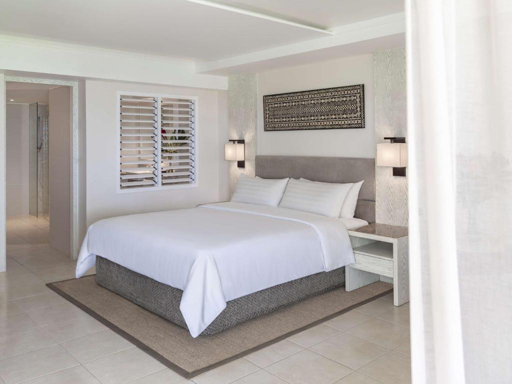 Postel nebo postele na pokoji v ubytování Shangri-La Yanuca Island, Fiji